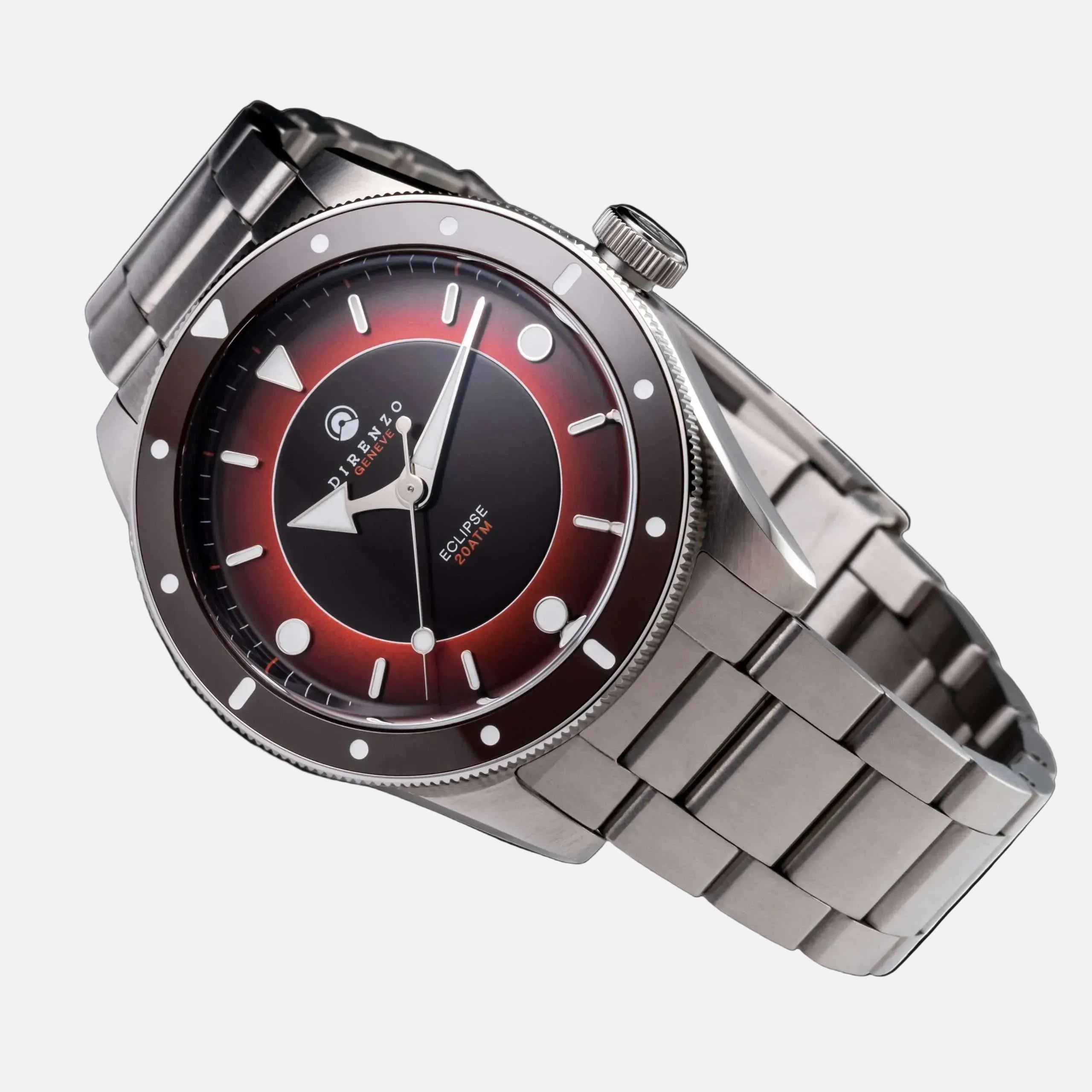Silver wristwatch with a black and red face on a white background