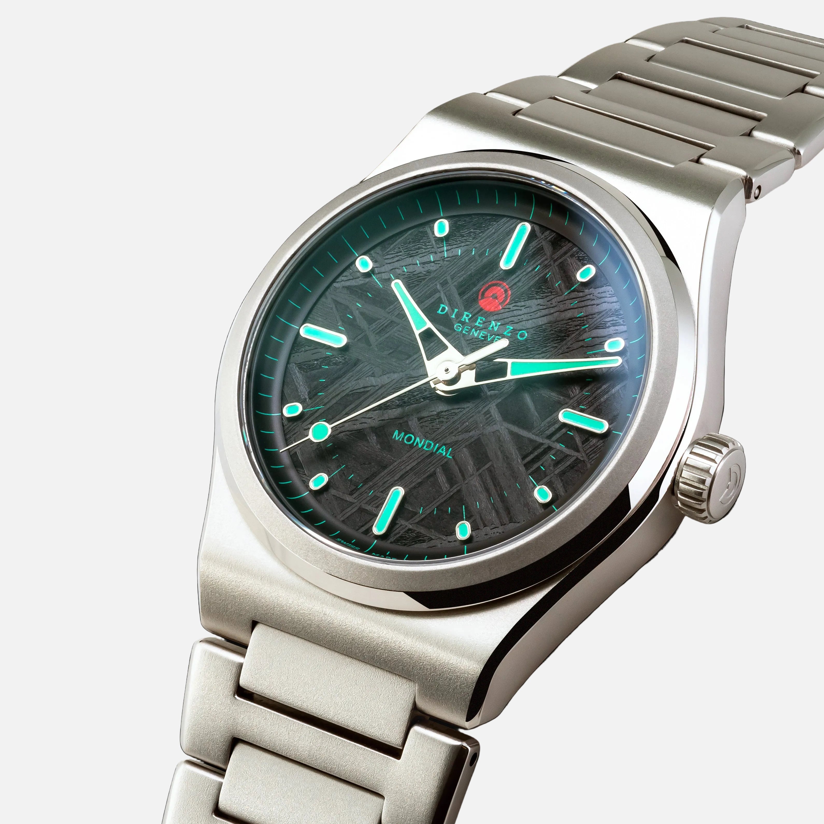 Silver wristwatch with a dark face and visible brand name on a black background