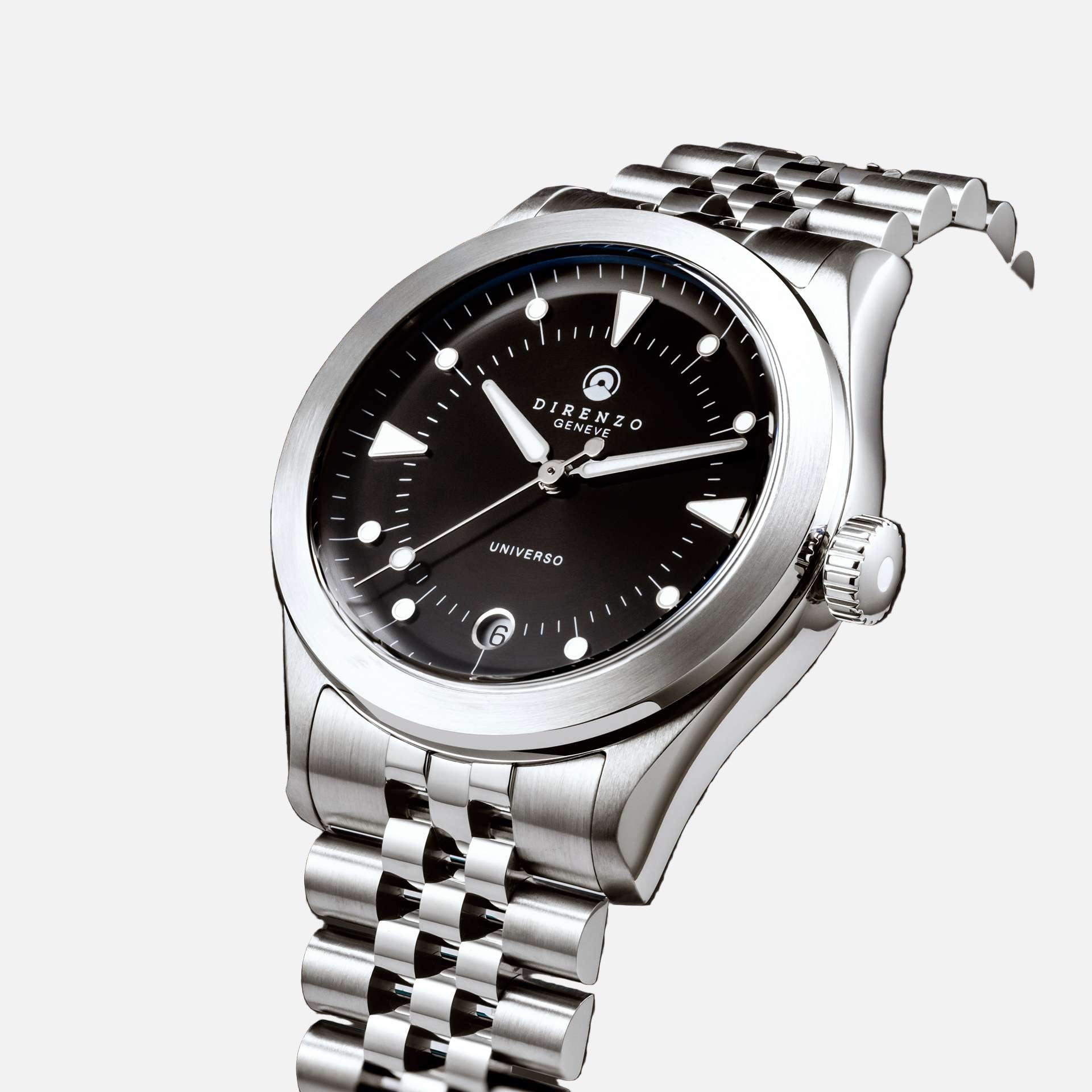 Silver wristwatch with black dial on a dark background
