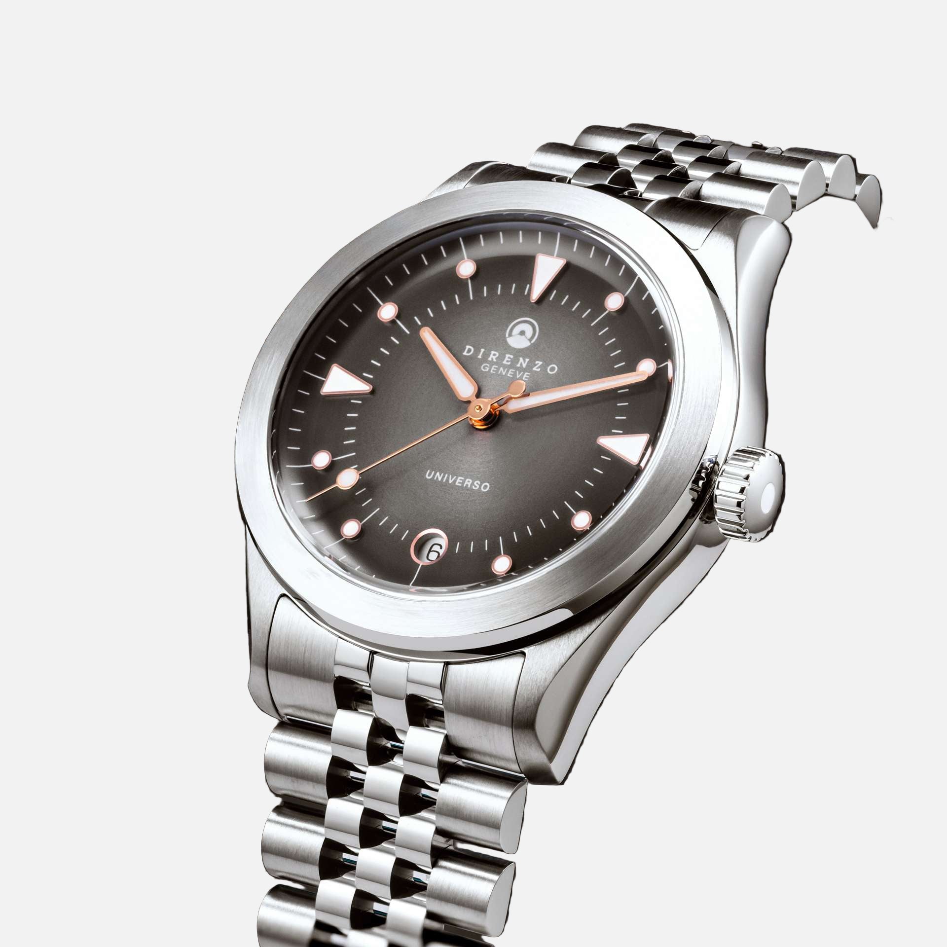 Silver wristwatch with a dark face on a black background